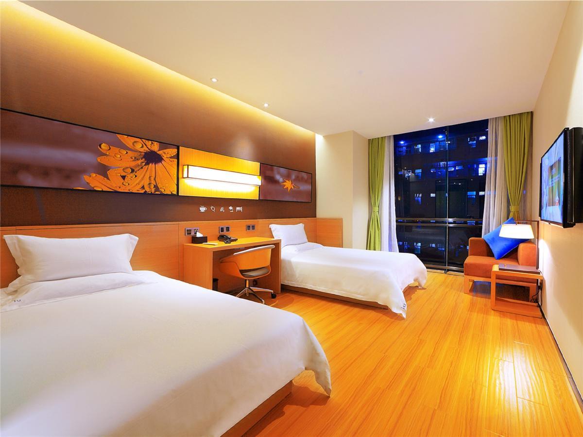 Iu Hotel Ruoyang Yiyang Wenhua Road Экстерьер фото