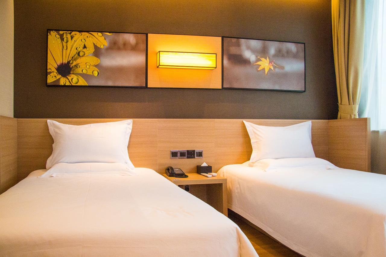 Iu Hotel Ruoyang Yiyang Wenhua Road Экстерьер фото